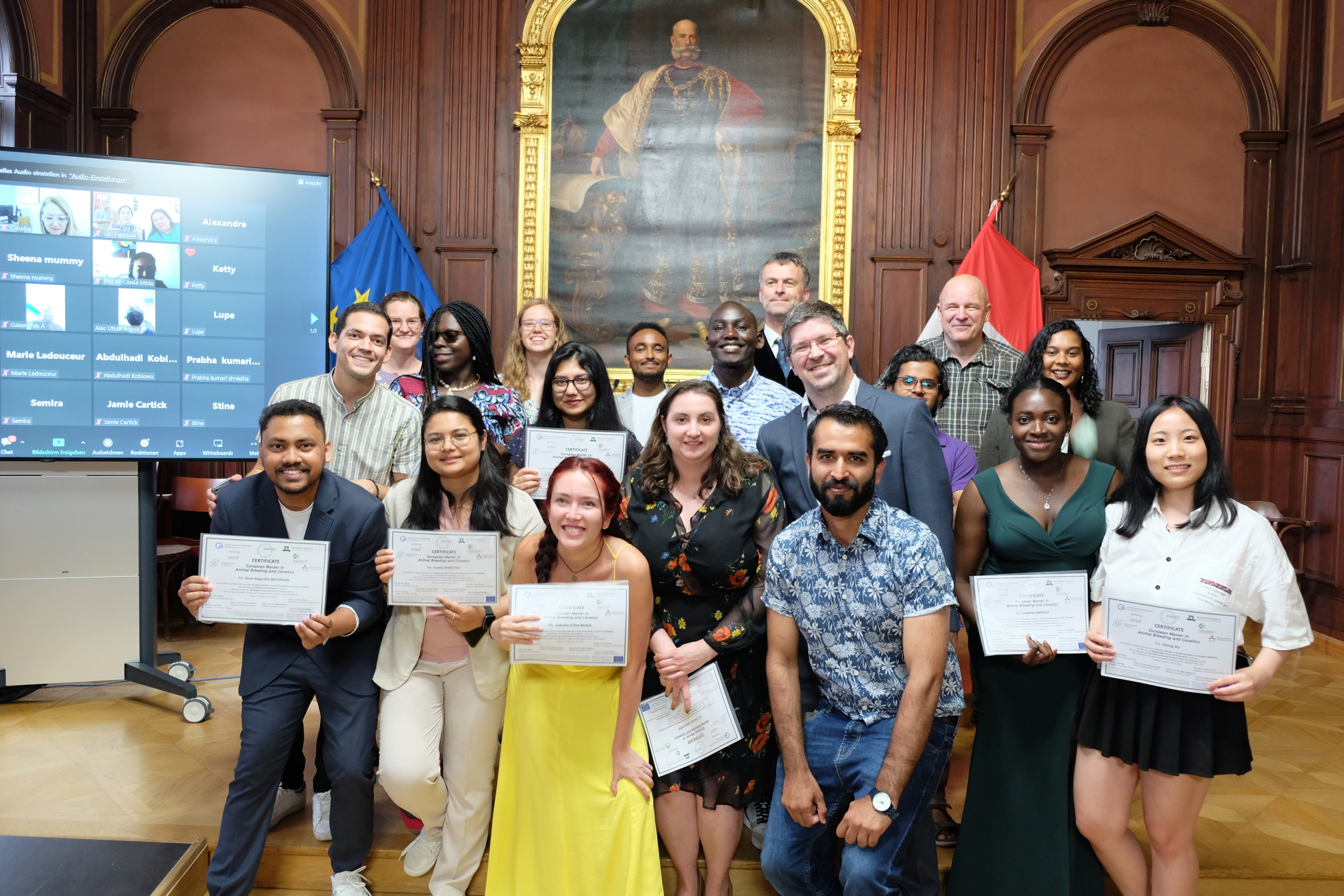 Photo of EMABG graduates with coordinators and vice rector